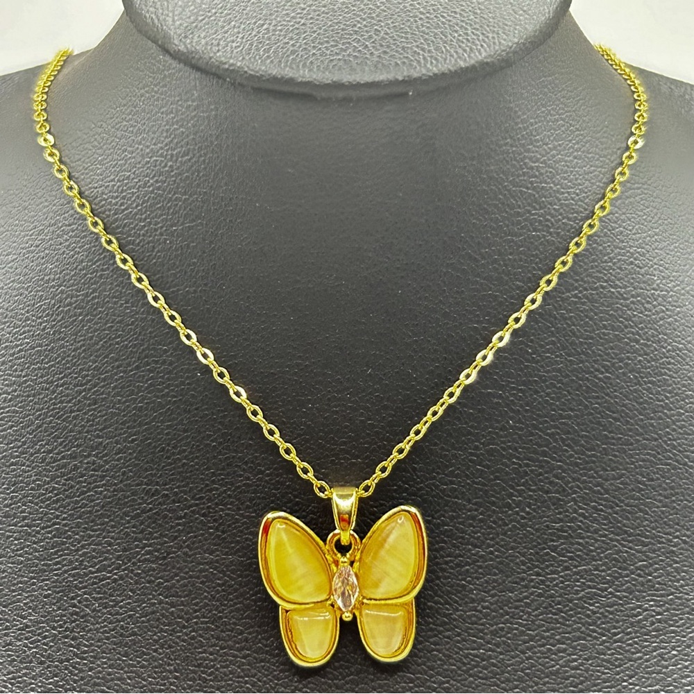 NWOT Dainty mother of pearl butterfly on stainless steel 18 K gold plated